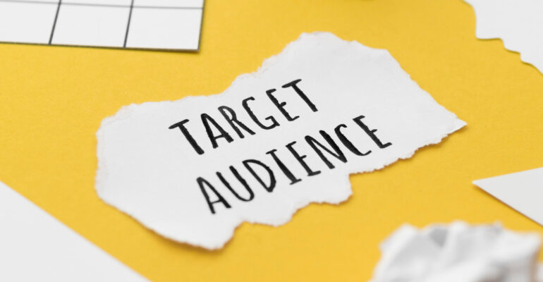 high-angle-target-audience-written-piece-paper